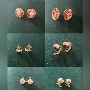 7 pairs brand new ear clips all together.